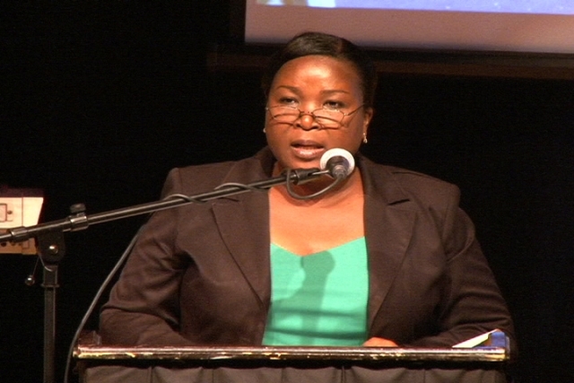Permanent Secretary in the Ministry of Education on Nevis Mrs. Lornette Queeley-Connor delivers remarks at the Back to School opening ceremony at the Nevis Performing Arts Centre